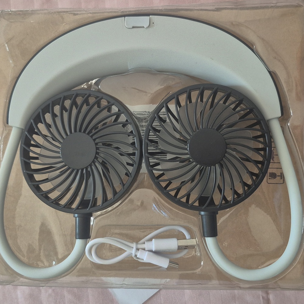 Portable Neck Fan. Grey and Black In Color.